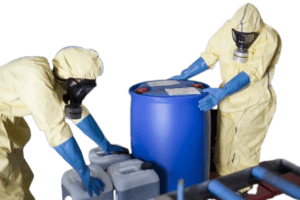 image of 2 workers wearing hazmat suites while handling hazardous waste